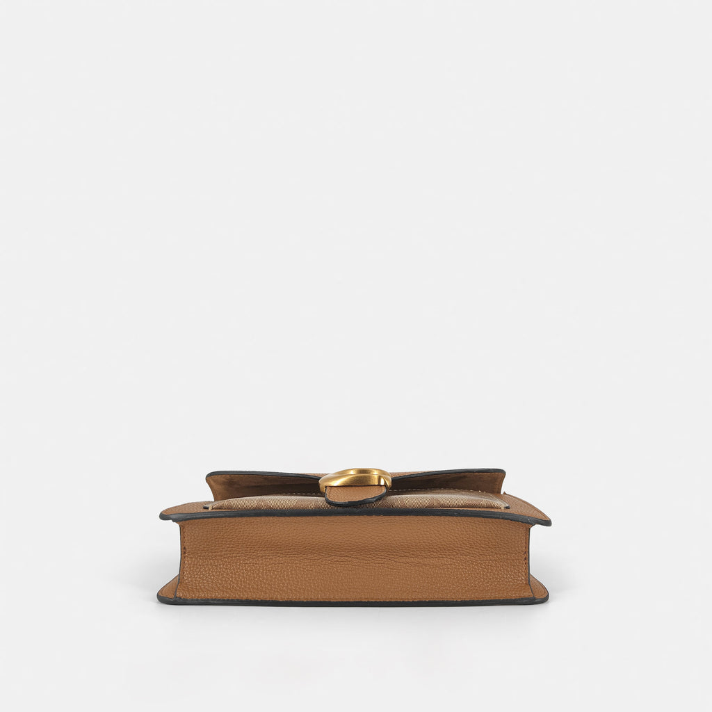 C -inspired sling bag