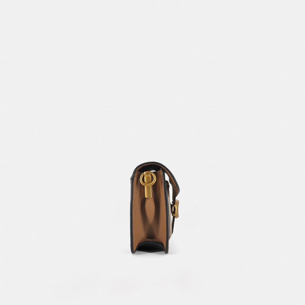 C -inspired sling bag
